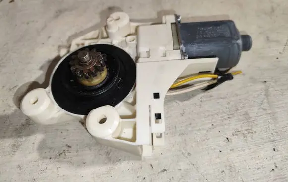 Front door window regulator motor