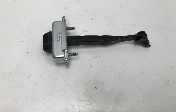 Front door check strap stopper