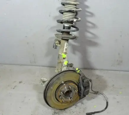 Front shock absorber with coil spring