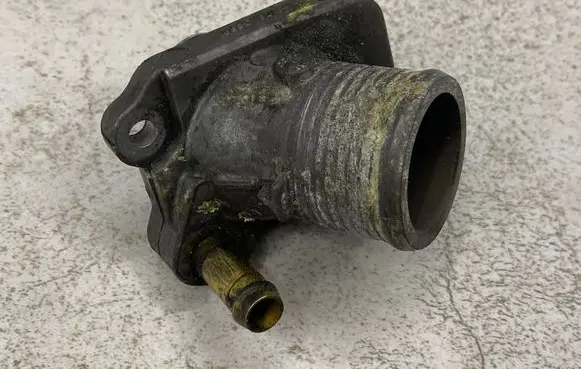 Thermostat/thermostat housing