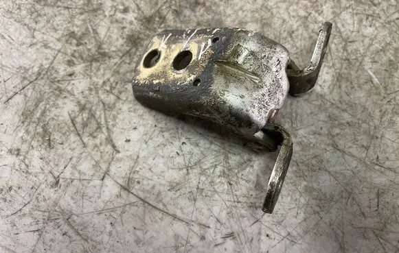 Nissan Navara D40 Front door upper hinge