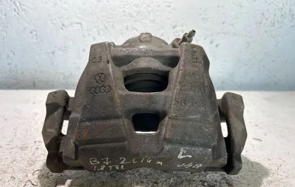 Volkswagen PASSAT B7 USA Front brake caliper