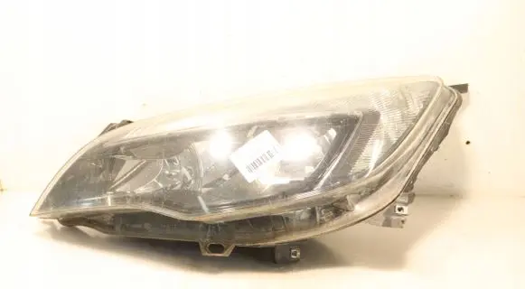 Opel Astra J Headlight/headlamp 13371595LH