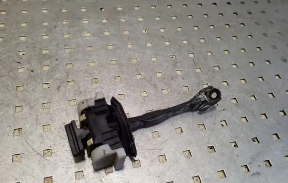 Front door check strap stopper