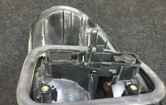 Renault Laguna I Tail light bulb cover holder