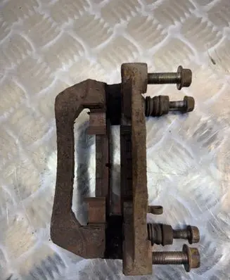 Subaru Legacy Brake caliper pad carrier rear 