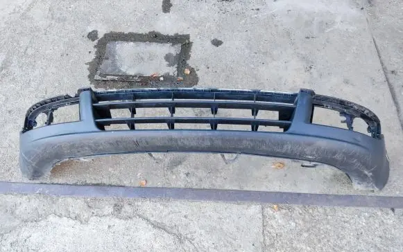 Volkswagen Touran I Front bumper lip 1T0805903A