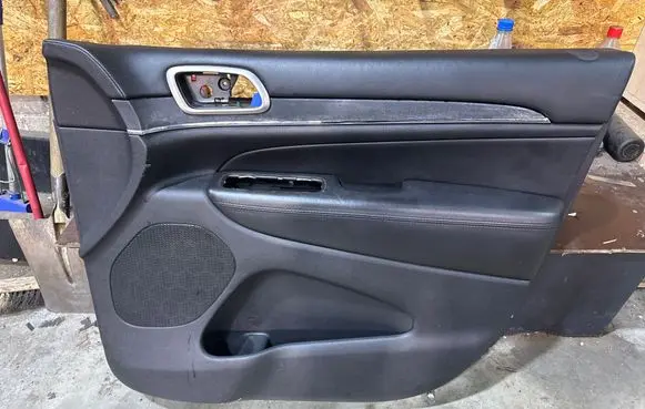Front door card panel trim