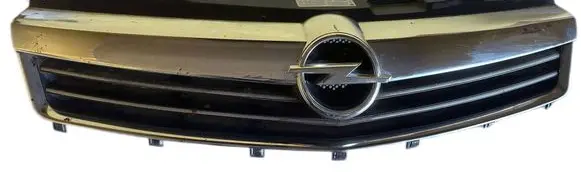 Opel Astra H Front bumper upper radiator grill 13225780