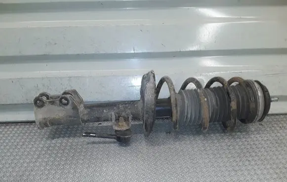Opel Corsa D Front shock absorber with coil spring 