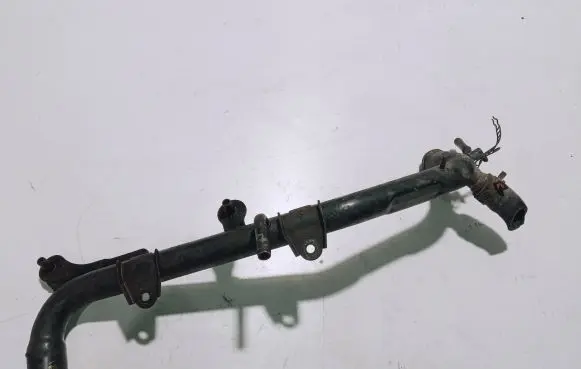 Volkswagen PASSAT B5 Engine coolant pipe/hose 06B121071E