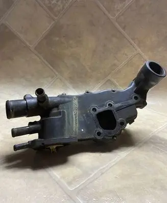 Thermostat/thermostat housing