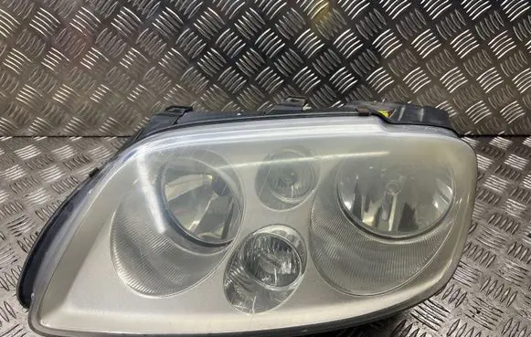 Volkswagen Touran I Headlight/headlamp 0301205201