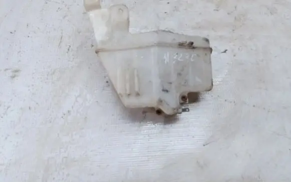 Mazda 323 Windshield washer fluid reservoir/tank