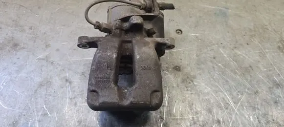 Volkswagen PASSAT B6 Rear brake caliper JBC0329