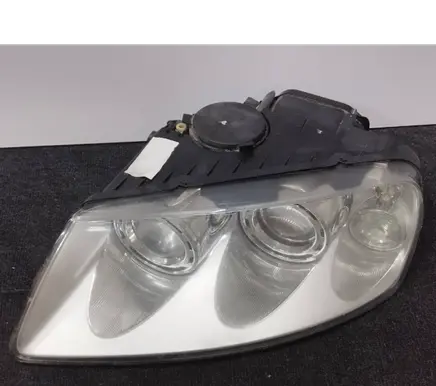 Volkswagen Touareg I Headlight/headlamp 7L6941015CF 89307851