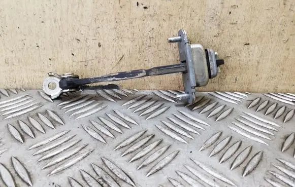 Subaru Outback Rear door check strap stopper