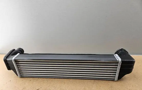 BMW 3 E46 Intercooler radiator 7786351 17517786351