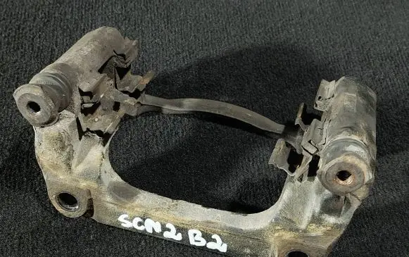 Renault Scenic II - Grand scenic II Front Brake Caliper Pad/Carrier 