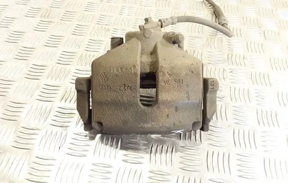 Volkswagen PASSAT B7 Front brake caliper