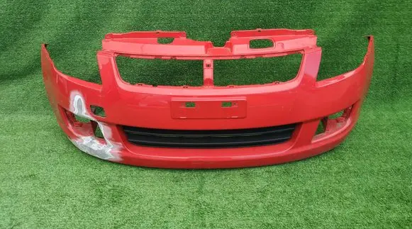 Suzuki Swift I Front bumper 717113K00