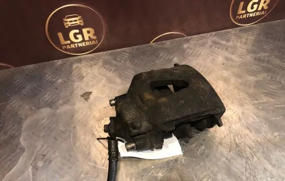 Volkswagen Golf IV Front brake caliper