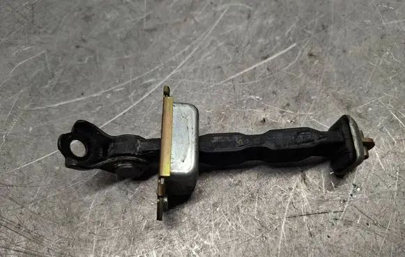 Nissan X-Trail T30 Front door check strap stopper