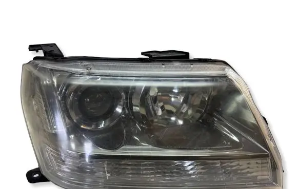 Suzuki Grand Vitara II Headlight/headlamp 10059079