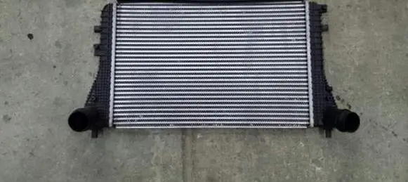 Volkswagen Golf VII Intercooler radiator 1K0145803AF