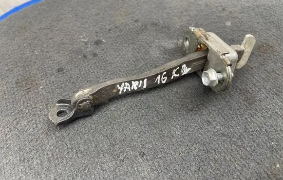 Toyota Yaris Rear door check strap stopper