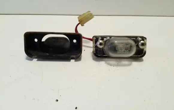 Subaru Outback Number plate light 0EW31