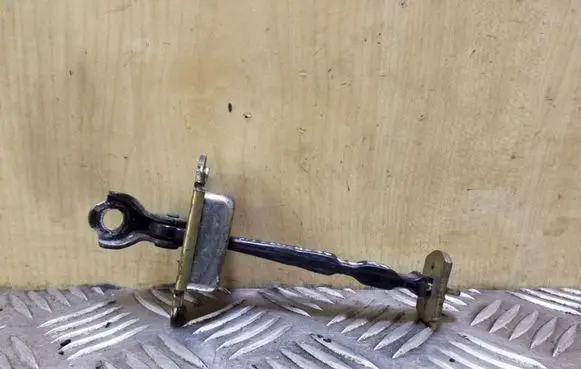 Nissan Note (E11) Front door check strap stopper