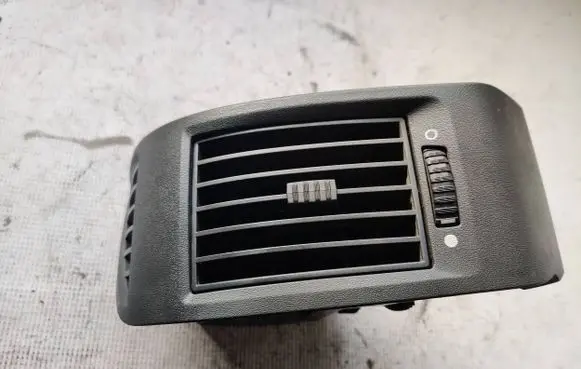Dash center air vent grill