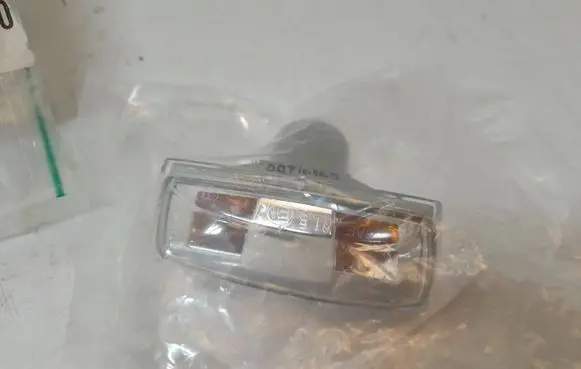 Opel Corsa D Front fender indicator light 13497989 13497990