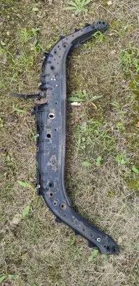 Top upper radiator support slam panel