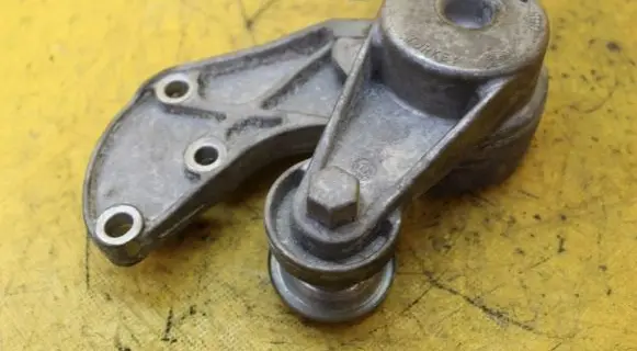 Porsche Cayenne (9PA) Timing belt tensioner 03H145299C