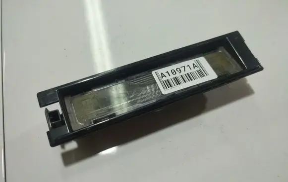 Nissan Micra Number plate light 22350100 2235-01-00