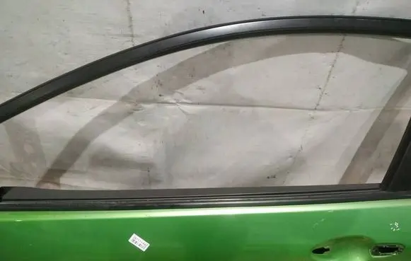 Mazda 2 Front door glass trim molding 