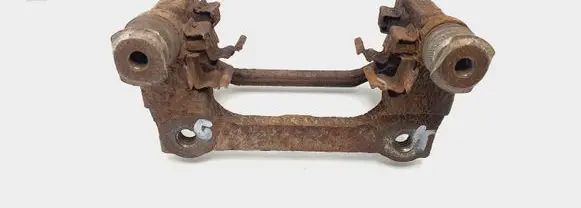 Opel Corsa D Brake caliper pad carrier rear 