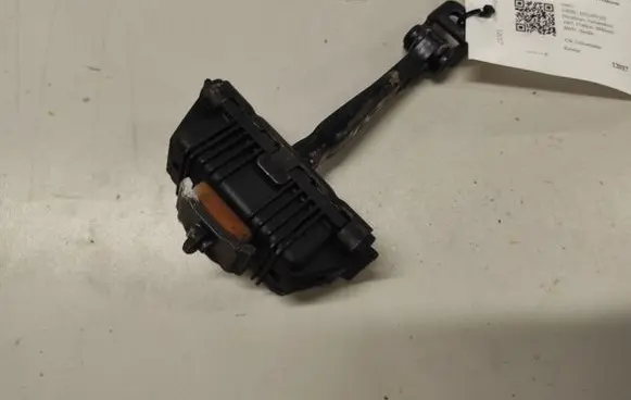 Front door check strap stopper