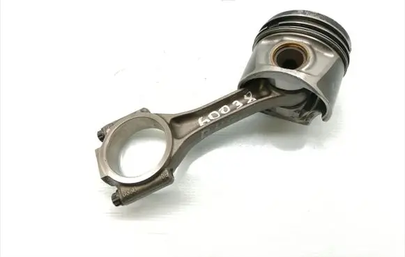 Volkswagen Golf V Piston with connecting rod 038J