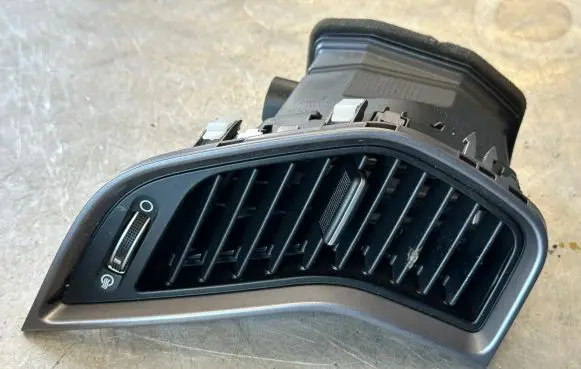 Hyundai Santa Fe Dash center air vent grill 974102W000