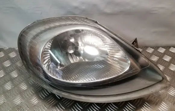Opel Vivaro Headlight/headlamp 7700311374