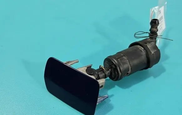 Opel Zafira B Headlight washer spray nozzle 325769024 IMPRK1581084