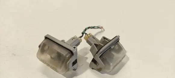 Mazda 6 Number plate light 13061971