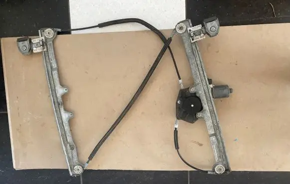 Mitsubishi Colt Front door window regulator with motor 0130822207