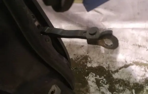 Mazda 2 Front door check strap stopper 