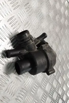 Thermostat/thermostat housing