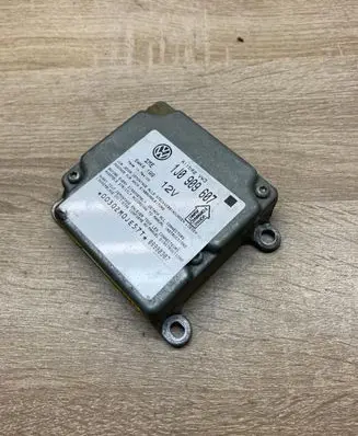 Volkswagen PASSAT B5 Airbag control unit/module 1J0909607 5WK4199