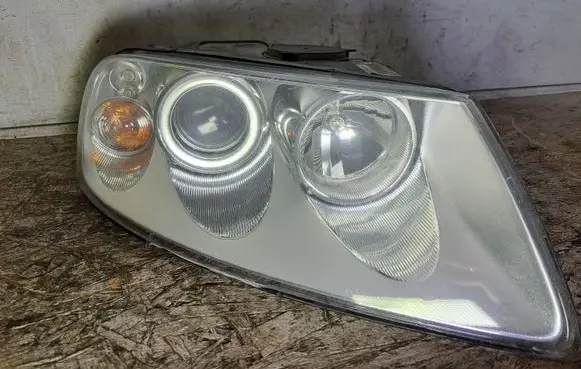 Volkswagen Touareg I Headlight/headlamp 7L6941016CE 89307881